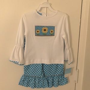 NWT girls 2T hand smocked sunflower top and pants.